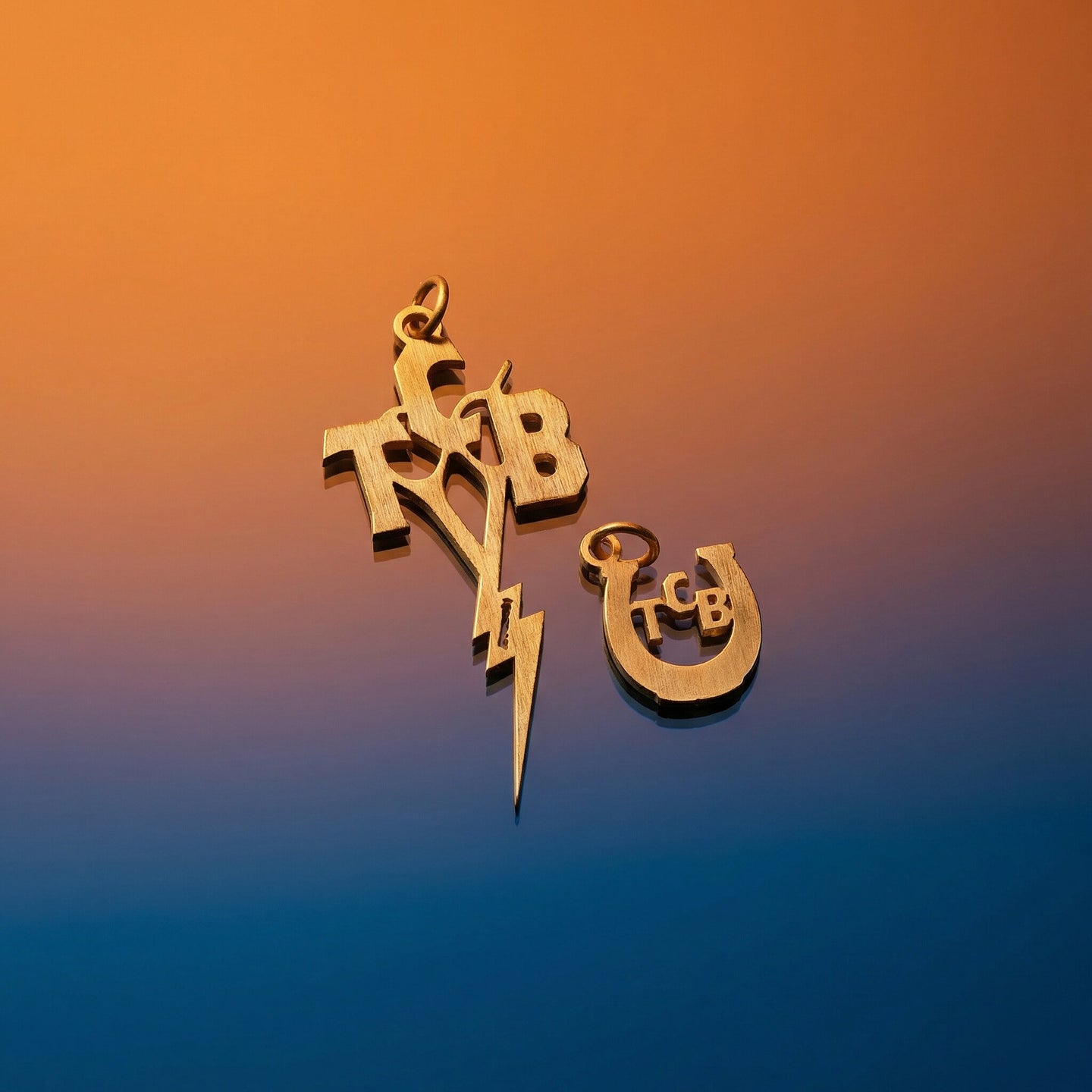 TCB Razor Charm